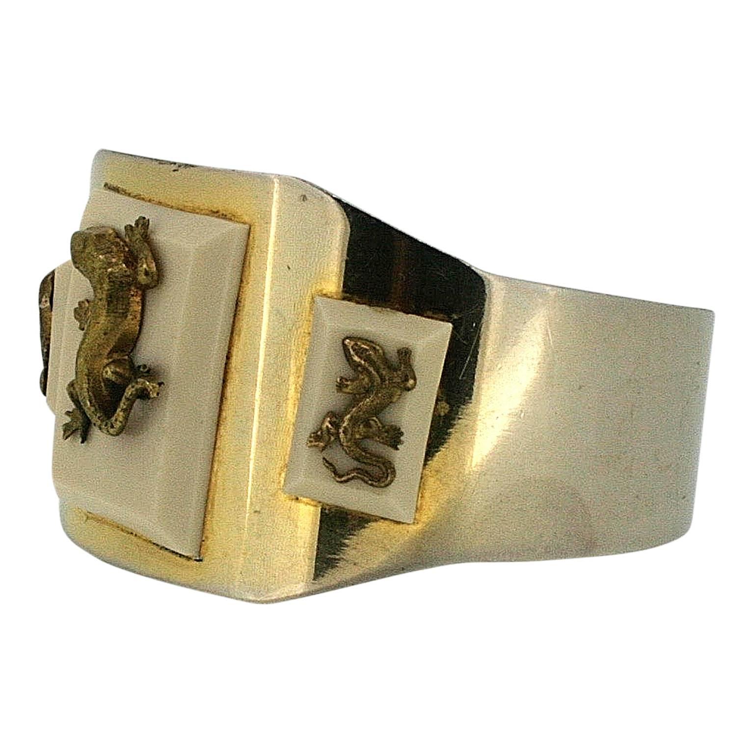Featuring an unusual and interesting design, this bangle dates from the 1930s and was created in France by Jean Painlevé.
Condition Report:
Good - Some rubbing to the silver tone metal, so that it appears gilded in places. This consistent with age