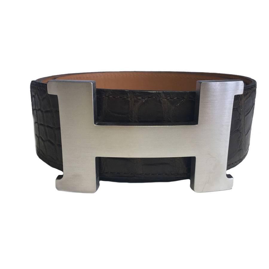 Beautiful Hermes belt in brown crocodile porosus, buckle H in silver plated palladium. Smooth gold leather inside.Never worn.
Dimensions:  from the buckle to the central hole: 95 cm, H : 8.3x5 cm

The belt has three holes, possibility to add more to