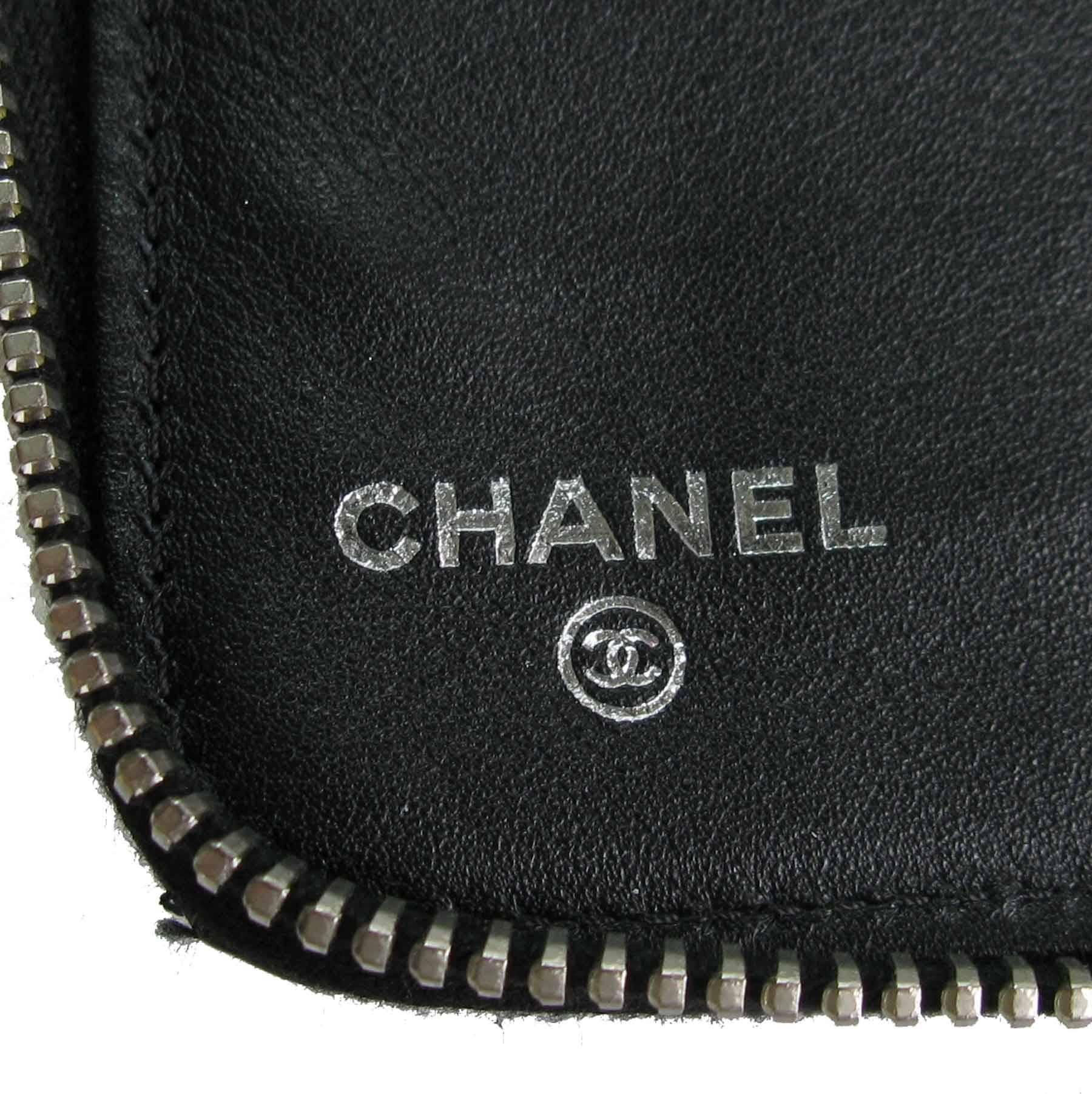 CHANEL Zipped Wallet in Quilted Black Patent Leather 1