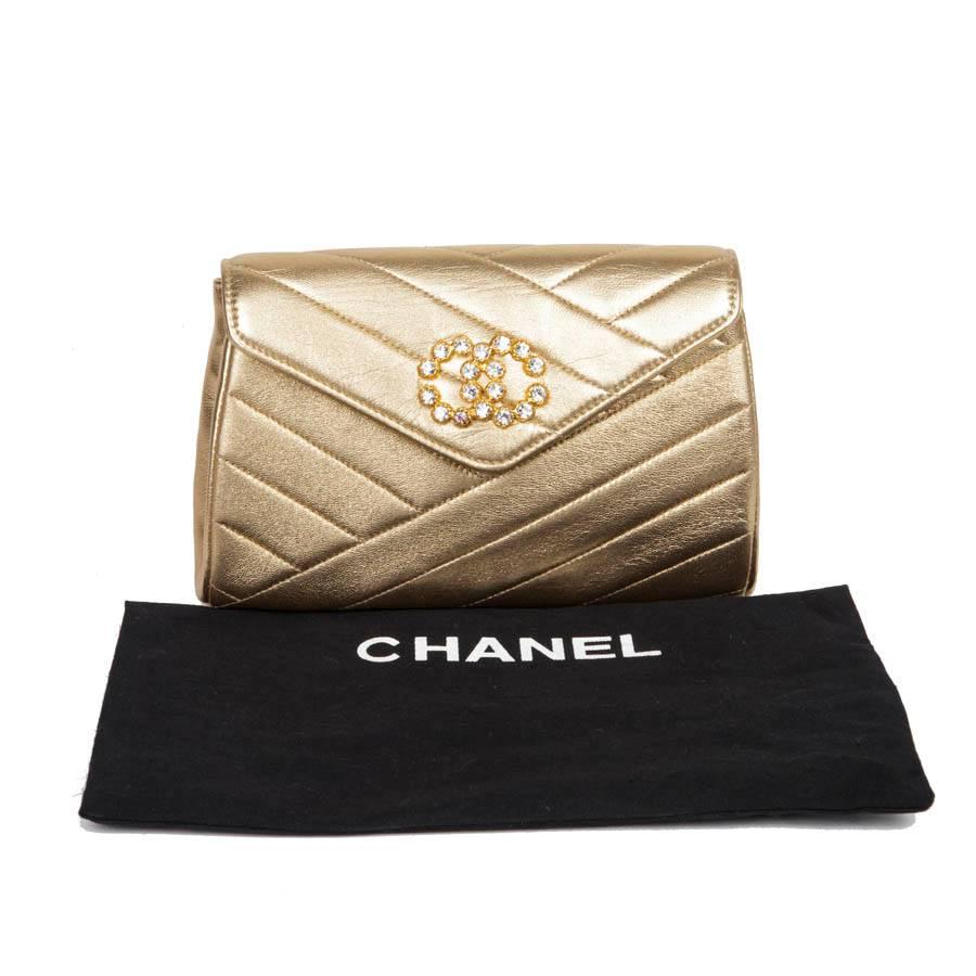 CHANEL Clutch in Gold Quilted Lamb Leather 6