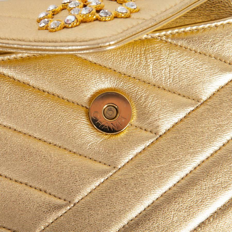 CHANEL Clutch in Gold Quilted Lamb Leather 5