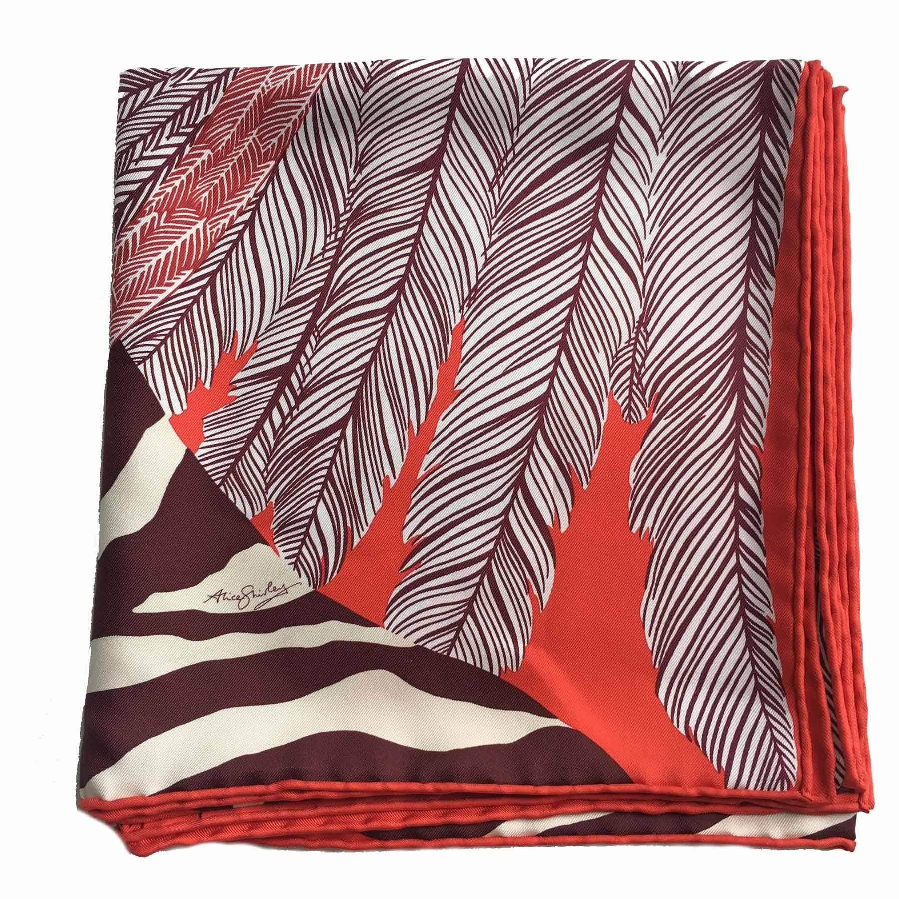Very beautiful Hermès 'ZEBRA PEGASUS' scarf in red, violet and beige silk.

Designed by: Alice Shirley

Delivered in a Valois Vintage Paris Dustbag
