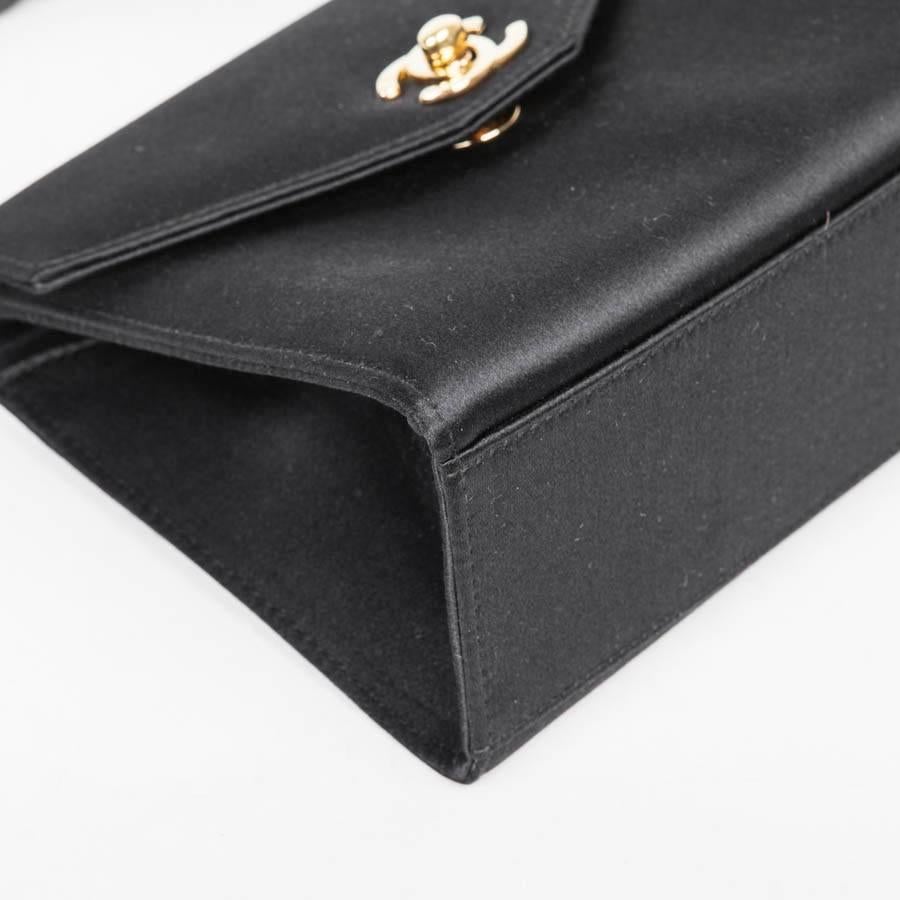 Mini CHANEL Couture Flap Bag in Black Silk Satin. 1