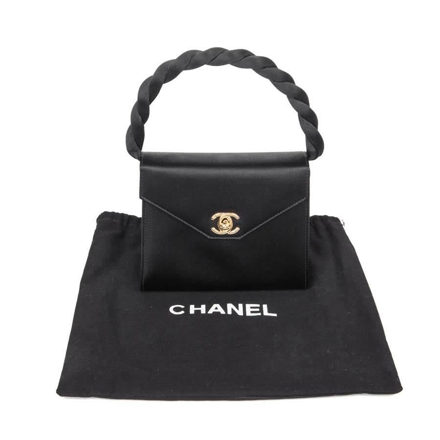 Mini CHANEL Couture Flap Bag in Black Silk Satin. 2