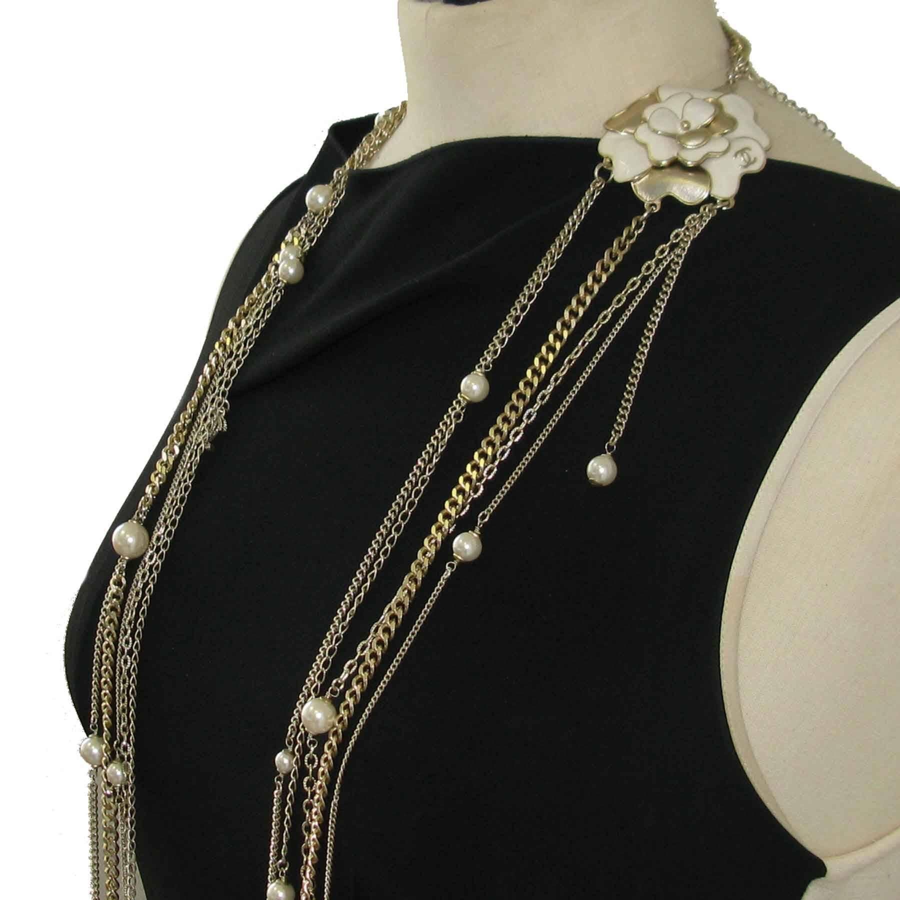 CHANEL Necklace in Gilded Metal, Pearls and White and Golden Camellia 2
