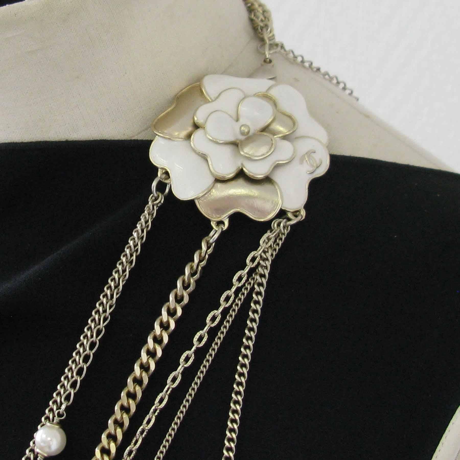 CHANEL Necklace in Gilded Metal, Pearls and White and Golden Camellia 3