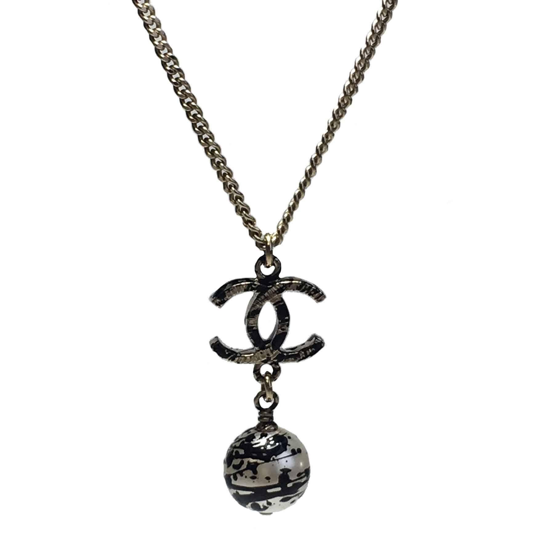 CHANEL Pendant Necklace in Gilded Metal and Pearl with Graffiti Effect