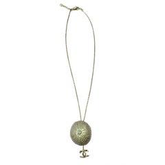 CHANEL Pendant 'Sea Urchin' Necklace in Gilded Metal 12