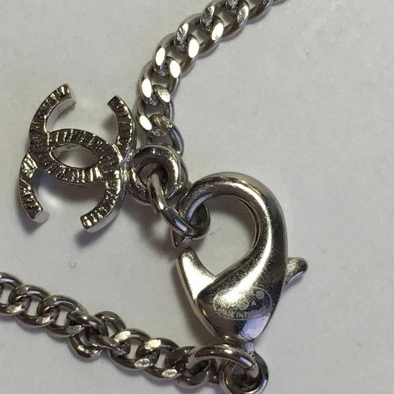 CHANEL 'Paris Salzburg' Pendant Necklace in Silver Plated Metal at 1stDibs