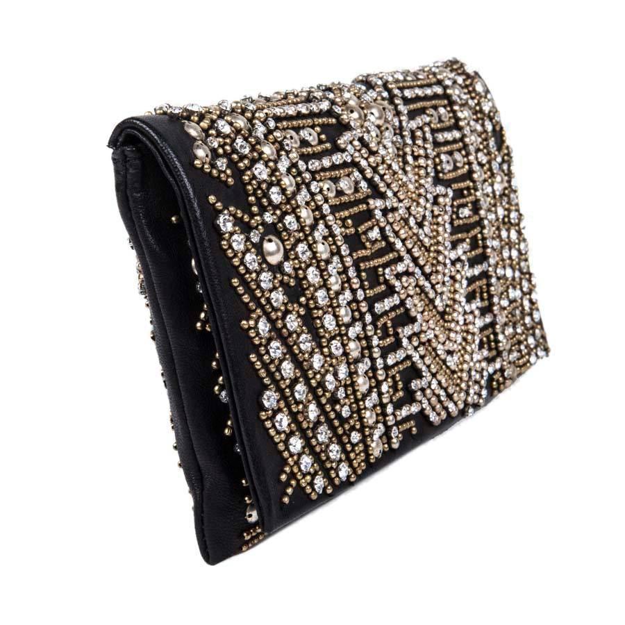 Black BALMAIN Clutch in Crumpled Leather, Studded in Golden Color and Rhinestones