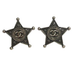 Used CHANEL 'Paris Dallas' Stud Earrings in Sheriff Star Shape