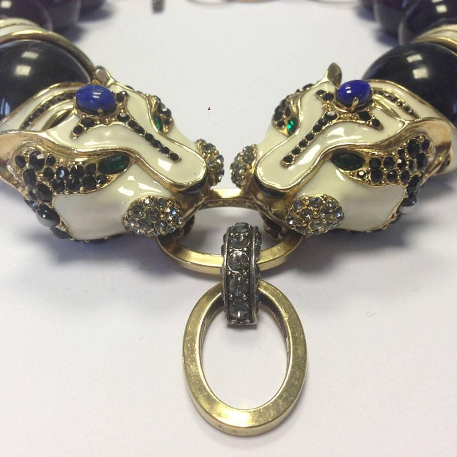 Very nice item!! Lanvin panther's head articulated necklace, in black and ivory resin, gilded metal and strass. Panther heads and clasps embellished with Swarovski stone. The two heads of panthers are connected by a brass ring. Never