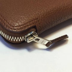 HERMES Foldable Silky Pop Bag in Brown Leather and Orange Silk