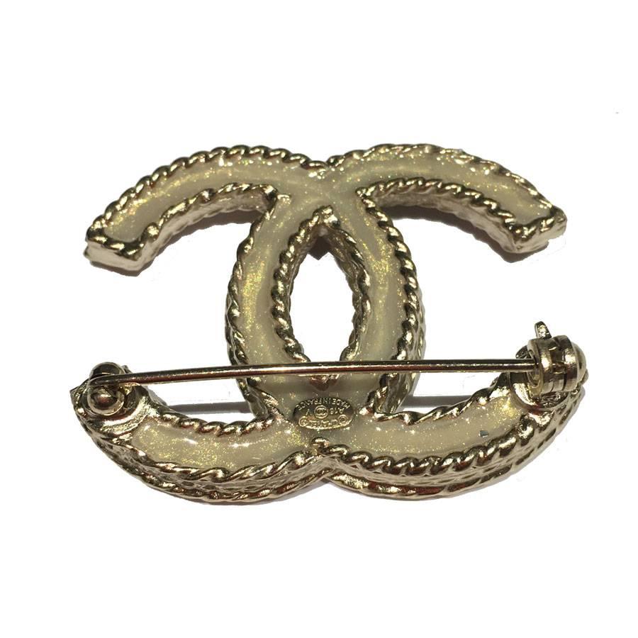 Women's CHANEL CC Brooch in Gilded Metal set with Rhinestones
