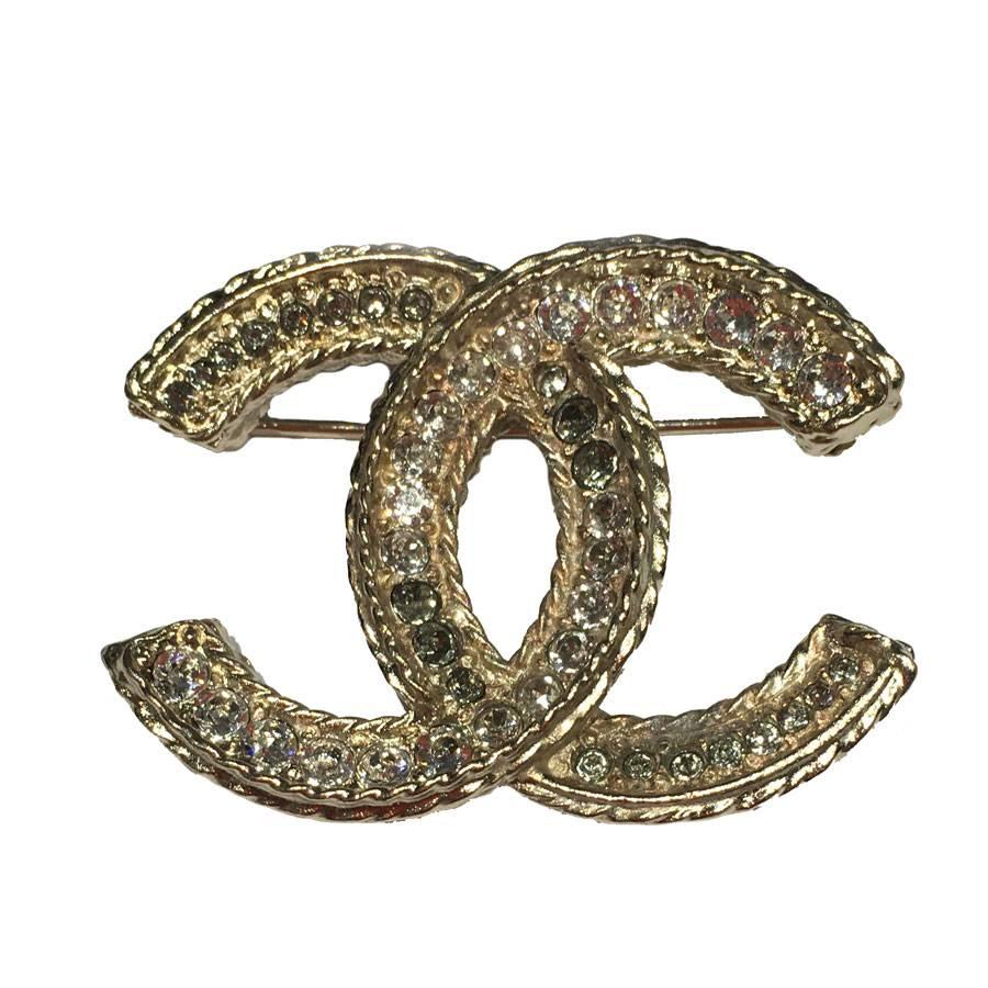 CHANEL CC Brooch in Gilded Metal set with Rhinestones