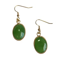 MARGUERITE DE VALOIS Stud Earrings in Light Green Molten Glass