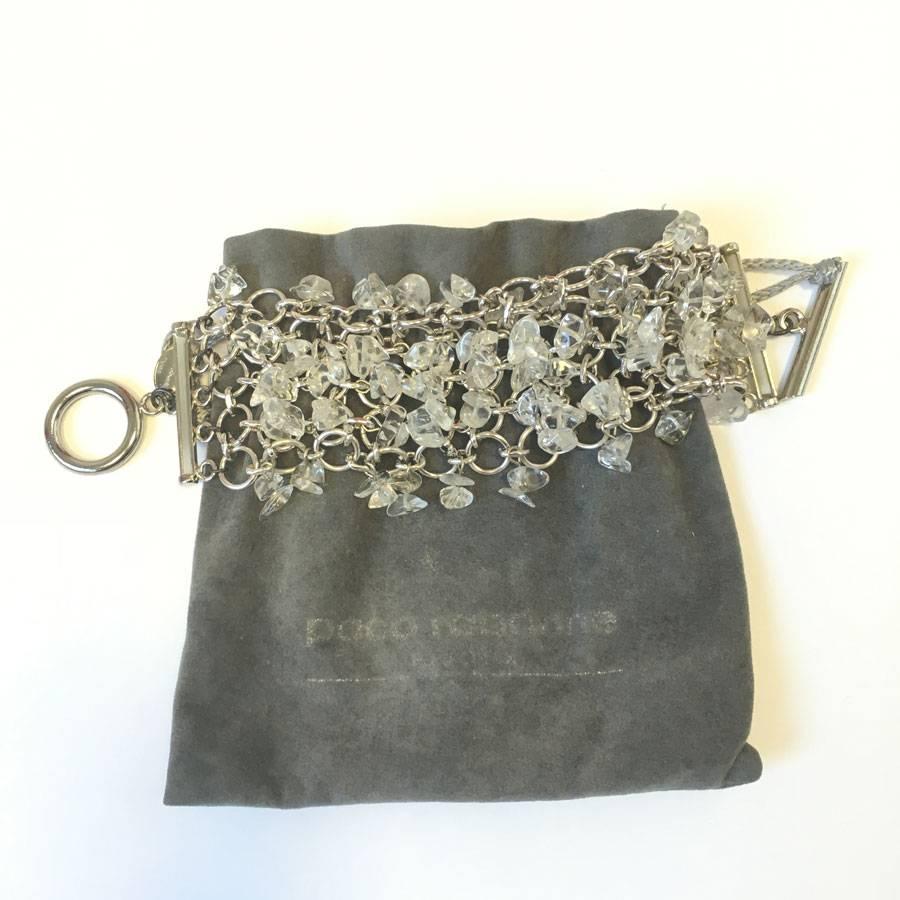 PACO RABANNE bracelet with silver plated metal rings and transparent pendants. 
T-clasp. Never worn.

Delivered in its PACO RABANNE dustbag