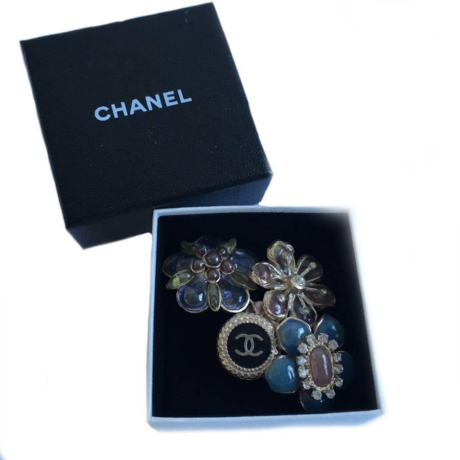 CHANEL Brooch in Molten Glass, Gilded Metal, Rhinestones and Black Enamel 4