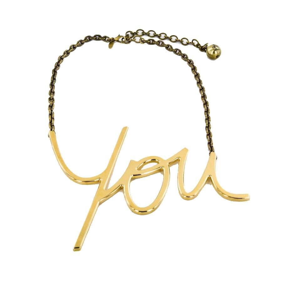 Iconic! Lanvin 'YOU' necklace in gilded metal with 18 carat gold. The chain is made of copper.

Dimensions of the Y : 14 cm in width - height : 10 cm

It will be delivered in a Valois Vintage Paris Dustbag