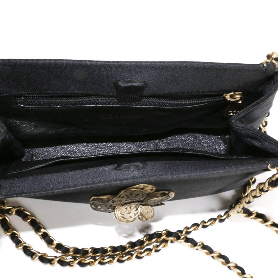 CHANEL Set : Evening Bag in Black Satin, Gilded Metal Clip-on Earrings and  Ring 1