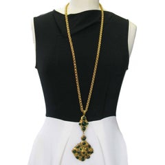 MARGUERITE DE VALOIS Necklace in Golden Metal, Pendant set with Molten Glass