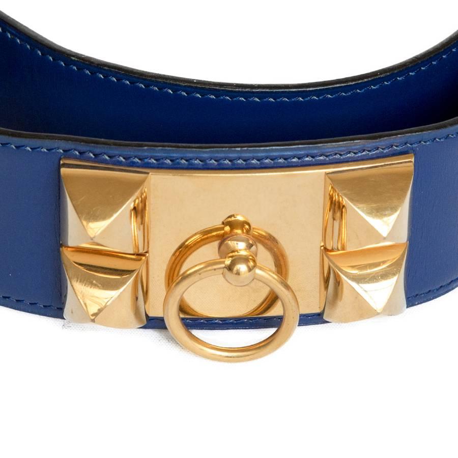Hermès Medor belt in blue ink box leather and gilded hardware, size 70EU

Stamp Q in a circle (1987)

Dimensions : Worn 68 cm at first notch and 73 cm at last notch.

Delivered in a VALOIS VINTAGE PARIS dustbag.