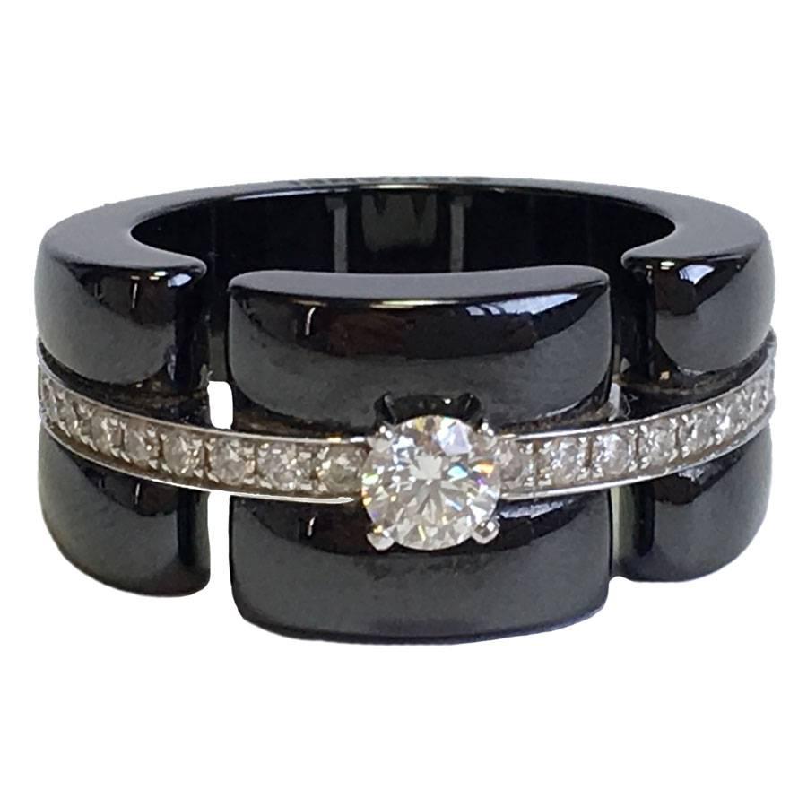 black ceramic and diamond ring