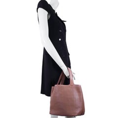 ALAIA Perforated Bag in Smooth Gold Leather