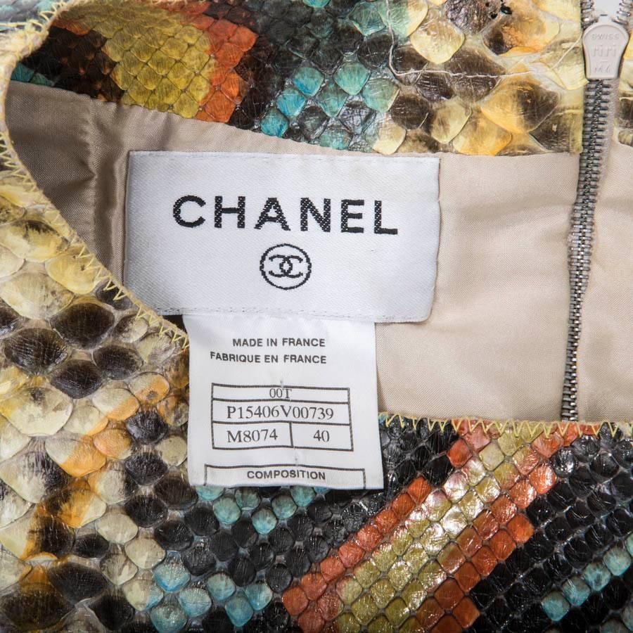 Exceptional Chanel sleeveless top in multicolored  python. Closes in the back with a zipper. The lining is in beige silk.

Summer 2000 collection

Dimensions : width 42 cm, shoulder width 38 cm.

Will be delivered in a Valois Vintage Paris Dustbag