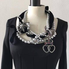 Collana girocollo Lanvin in metallo placcato argento con charms