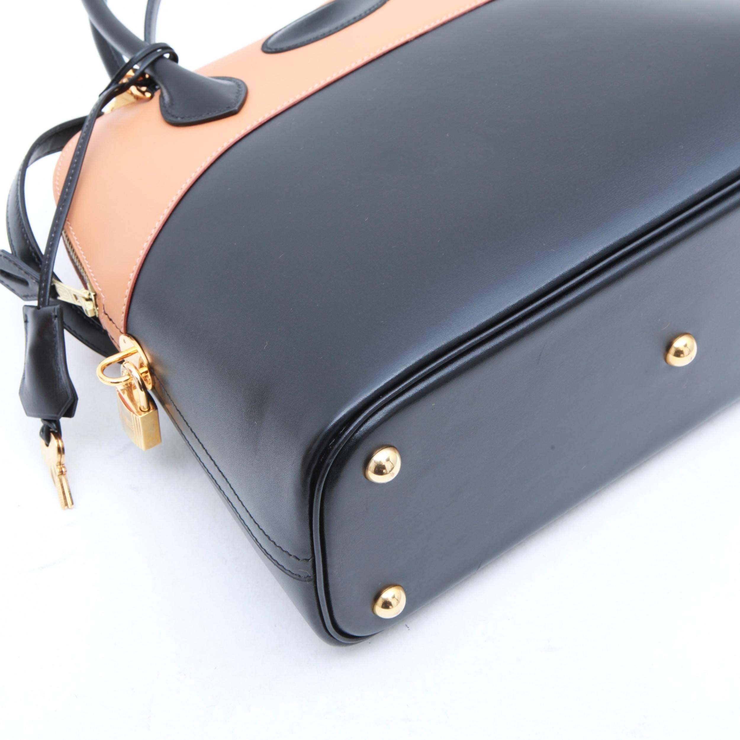HERMES 'Bolide' Bag in Two-Tone Gold and Black Box Leather 1