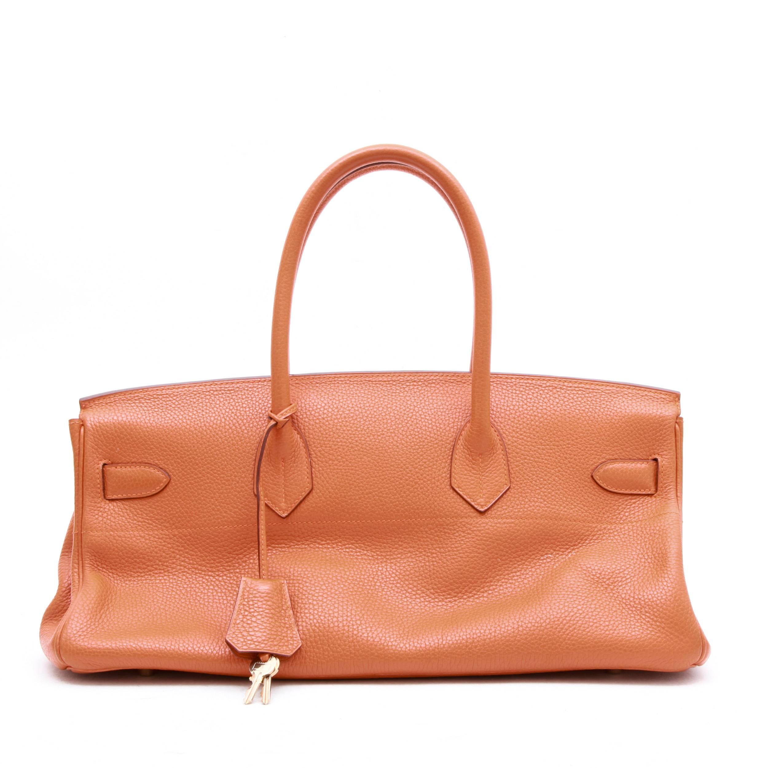 Hermès 'Shoulder' handbag in orange taurillon clémence leather. Palladium hardware.

Stamp I in a square, Year 2006. 

Will be delivered in its Hermes dustbag