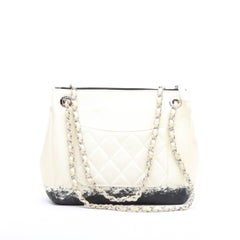 CHANEL Tasche aus beigem und schwarzem Lammleder