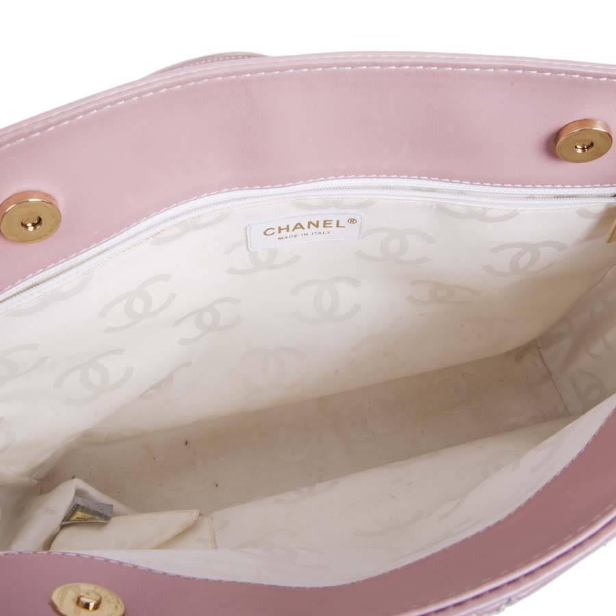 Women's or Men's CHANEL Bag in Pink Quilted Smooth Leather with a White Stitching