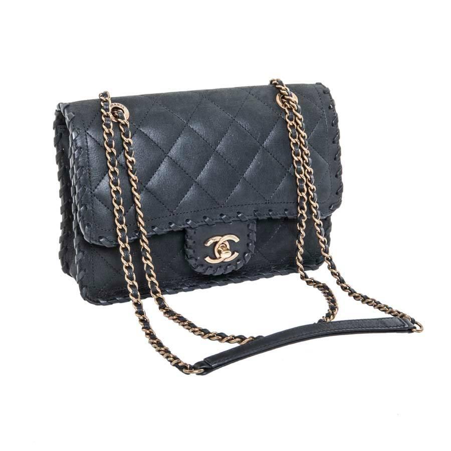 CHANEL Bag in Dark Green Quilted Leather with a Satin effect