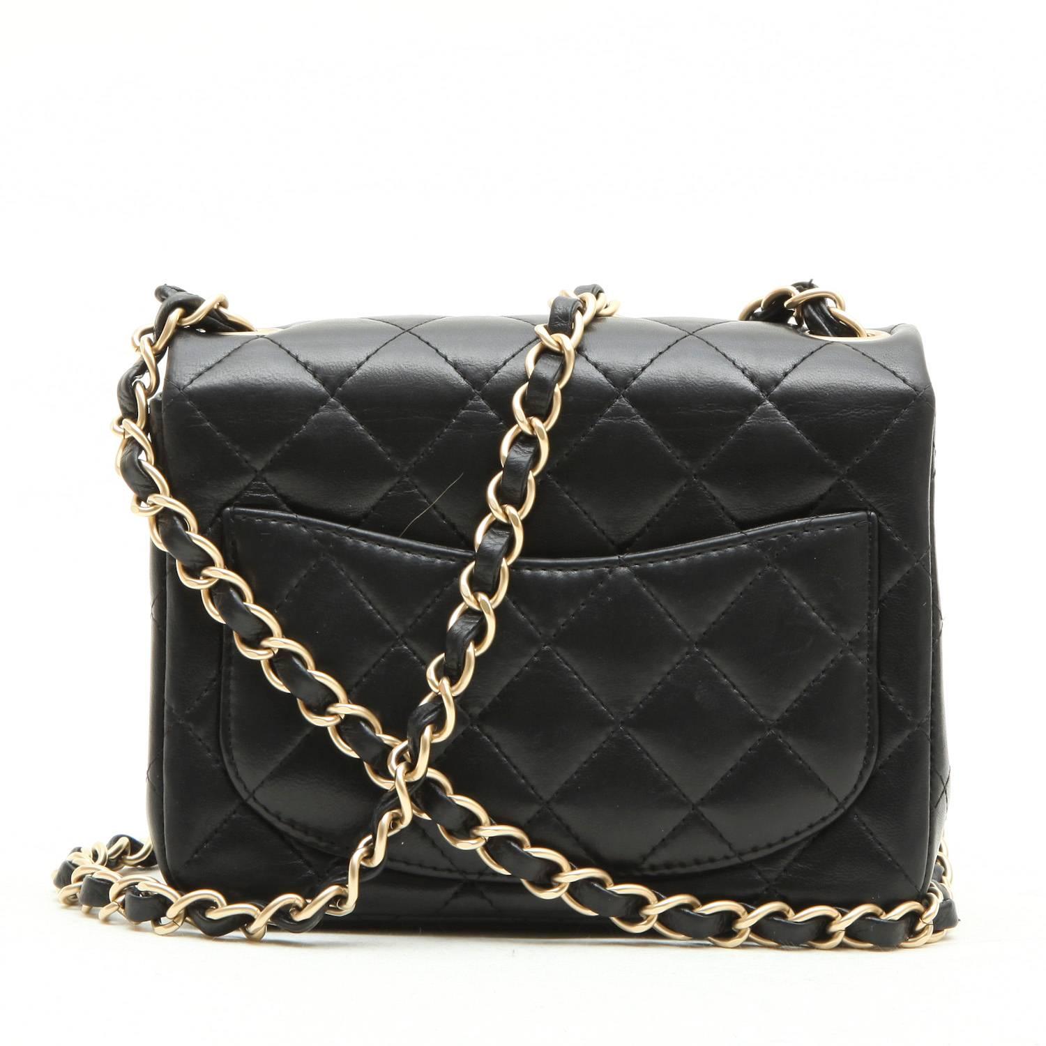 Mini CHANEL Bag in Black Quilted lambskin Leather 1
