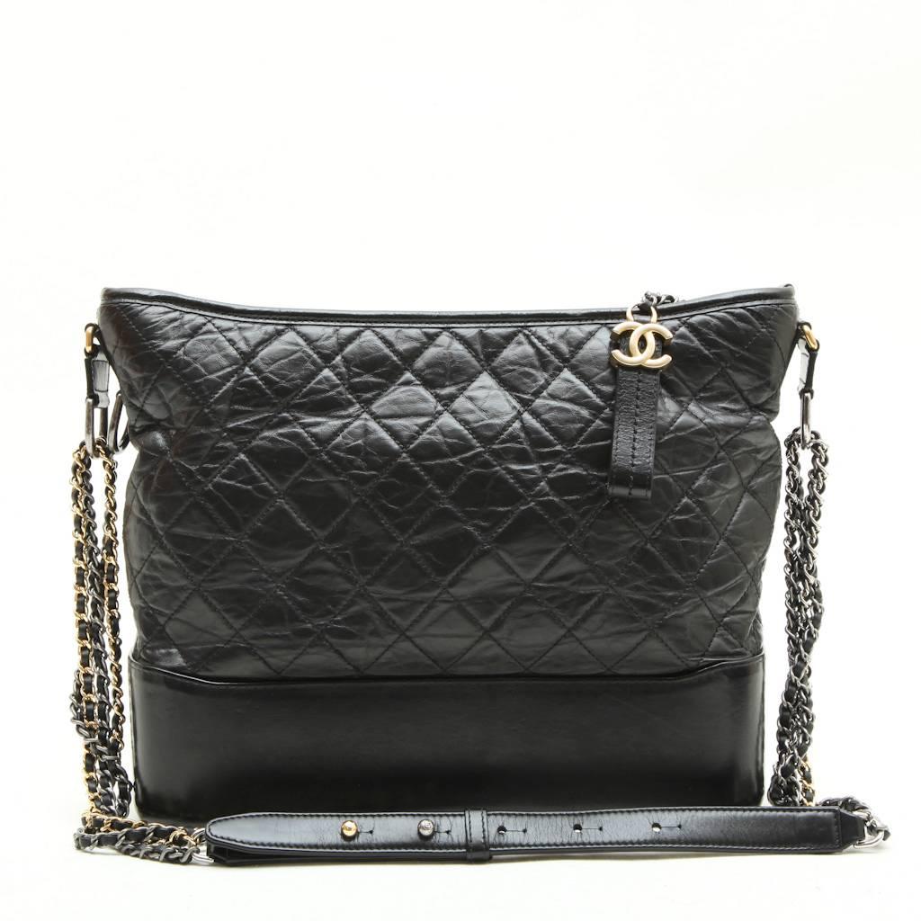 CHANEL Bag 'Gabrielle Hobo' in Aged Black Quilted Leather In Excellent Condition In Paris, FR