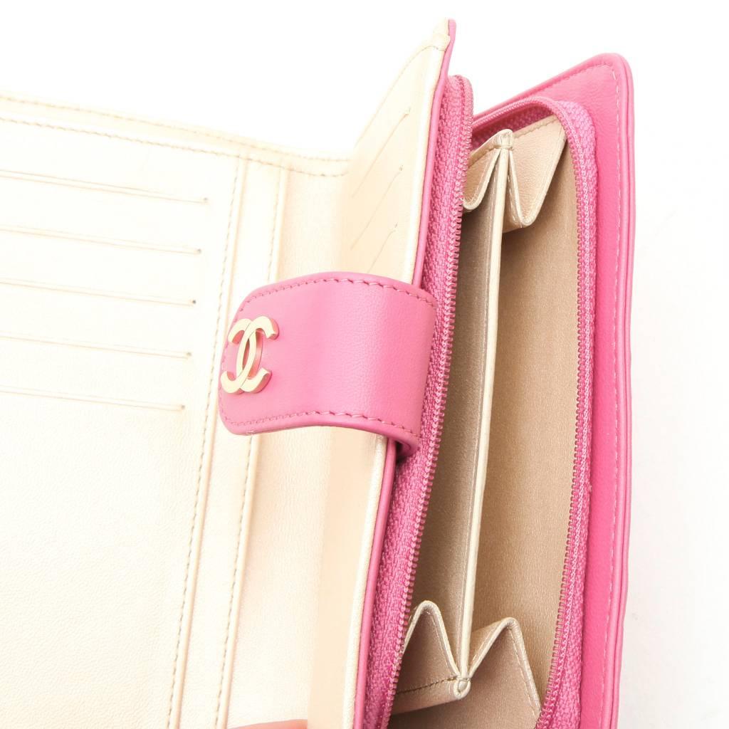 Women's Chanel Wallet in Pink Embossed with Camellias and CC Leather