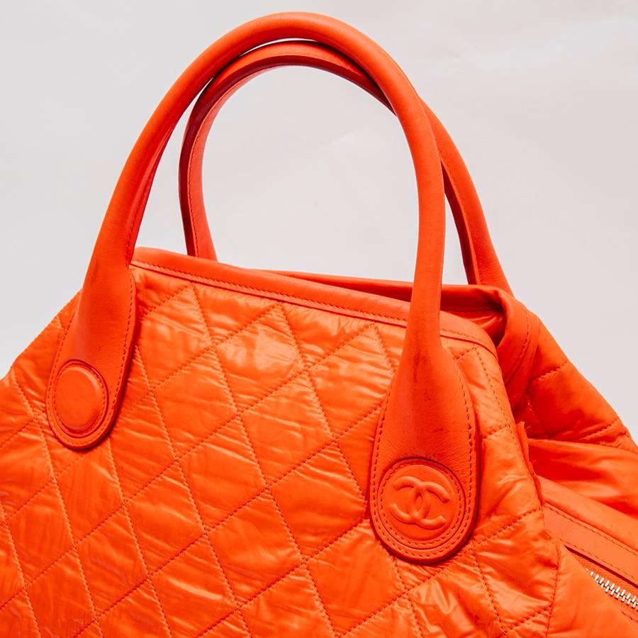 Red CHANEL 'Cocoon' Bag in Orange Waterproof Material