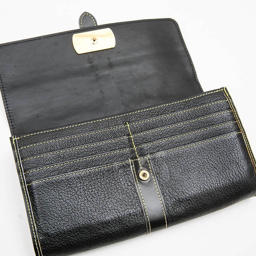 LOUIS VUITTON Clutch in Black Grained Leather with Saddle Stitching 1