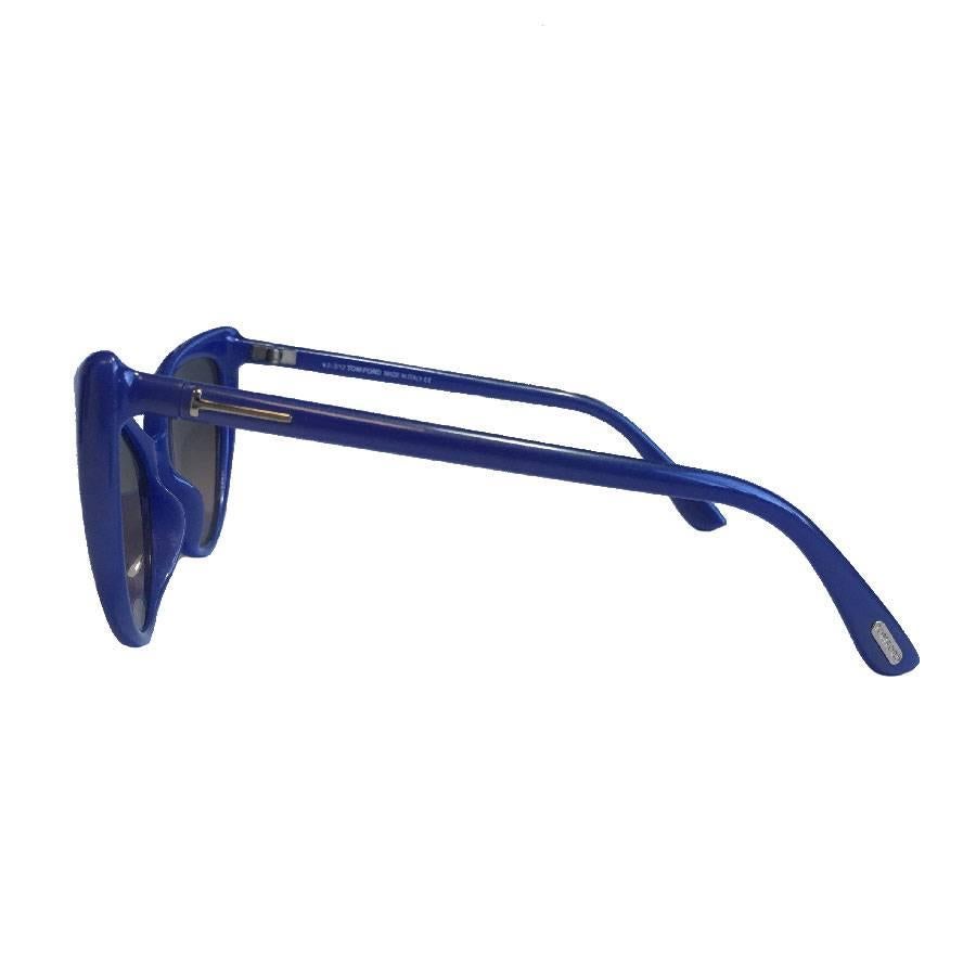 Tom Ford sunglasses in blue plastic. Anastasia model.

In very good condition. Made in Italy.

Dimensions: frame width: 13.2 cm, temple length: 13 cm, lens height: 4.2 cm

Will be delivered in a new, non-original dust bag