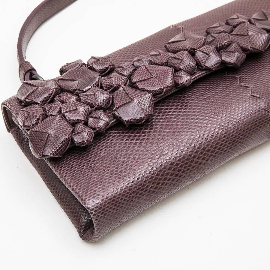 python effect leather handbag