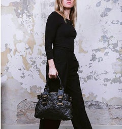 LOUIS VUITTON Bag in Black Leather and Brown Patent Leather Embroidered