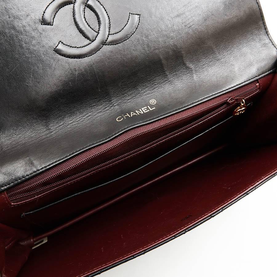CHANEL Vintage Clutch in Black Quilted Leather 4