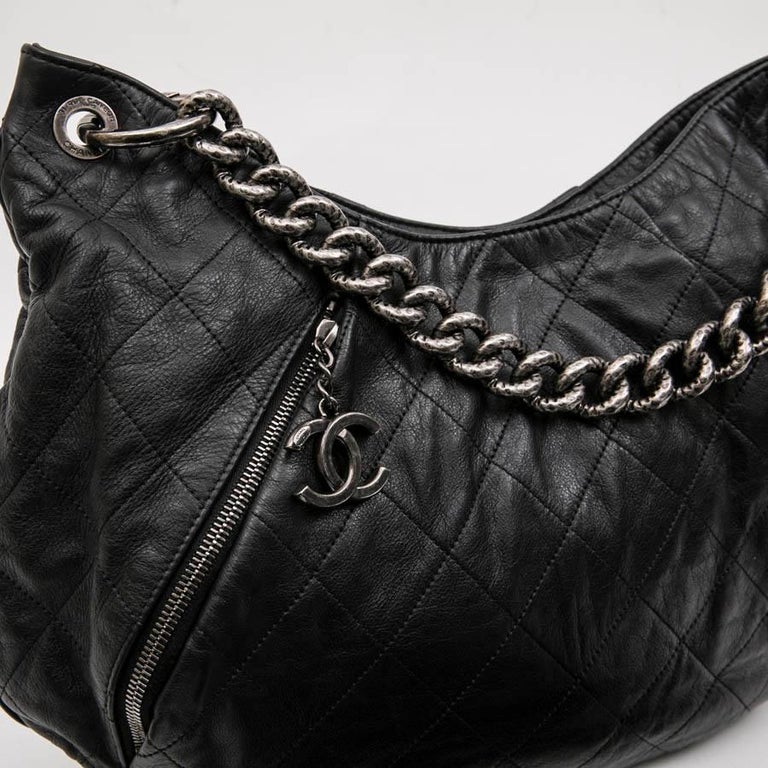 CHANEL Messenger Bag in Aged Soft Gray Quilted Lambskin Leather at