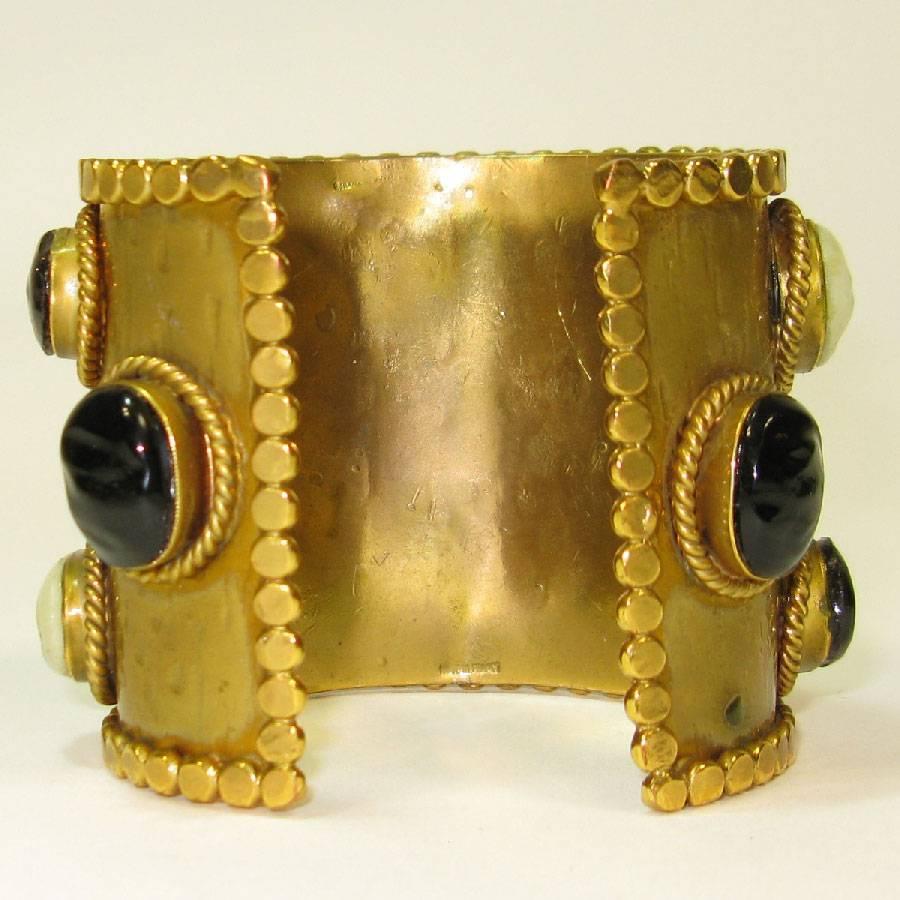 Women's Marguerite de Valois Aged Gilt Metal and Molten Glass Cabochons Cuff Bracelet For Sale