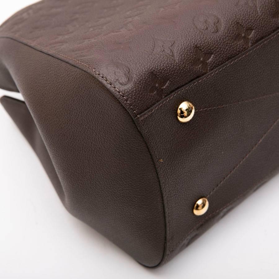 Black LOUIS VUITTON 'Montaigne GM' Bag in Monogram Empreinte Earth-Tone Leather