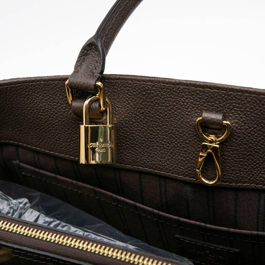 LOUIS VUITTON 'Montaigne GM' Bag in Monogram Empreinte Earth-Tone Leather 1