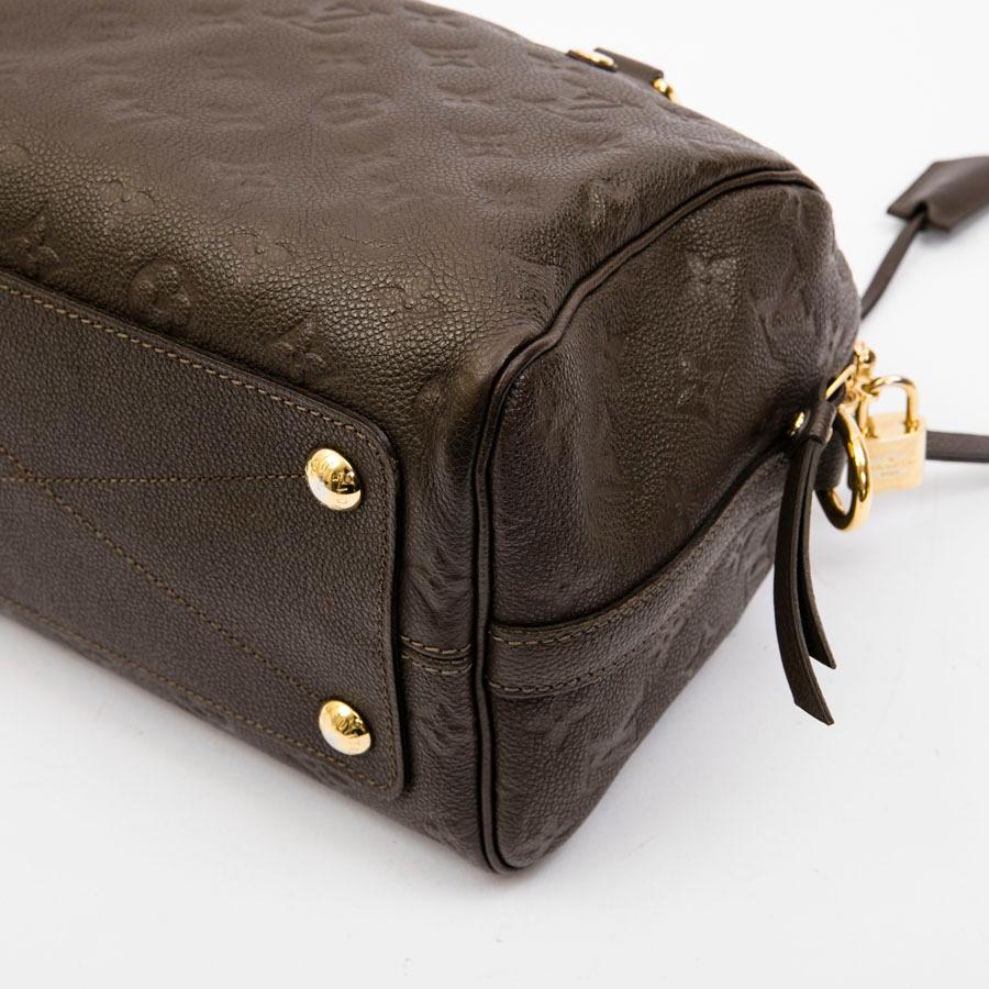 LOUIS VUITTON Speedy 25 Bag in Dark Brown Embossed Empreinte Leather In Good Condition In Paris, FR