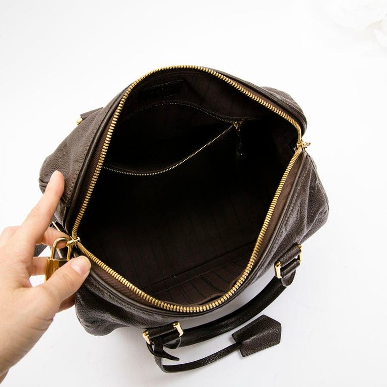 Louis Vuitton, a black Monogram Empreinte leather 'Speedy 25' handbag,  2016. - Bukowskis